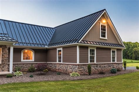 brown metal roof blue house|black house brown roof.